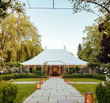 Houchins venue white marquee tent and garden pathway