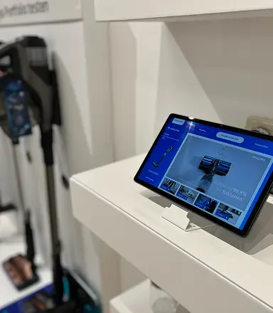 Cordless vacuum interactive product kiosk