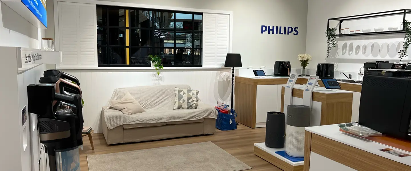 Philips home lifestyle showroom with appliances and an air purifier