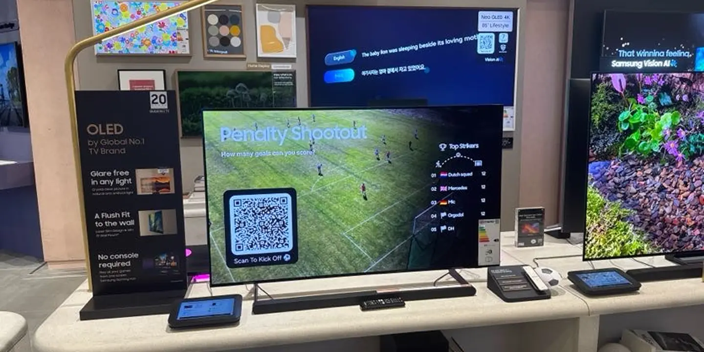 Customer playing the penalty shootout game on a Samsung TV wall