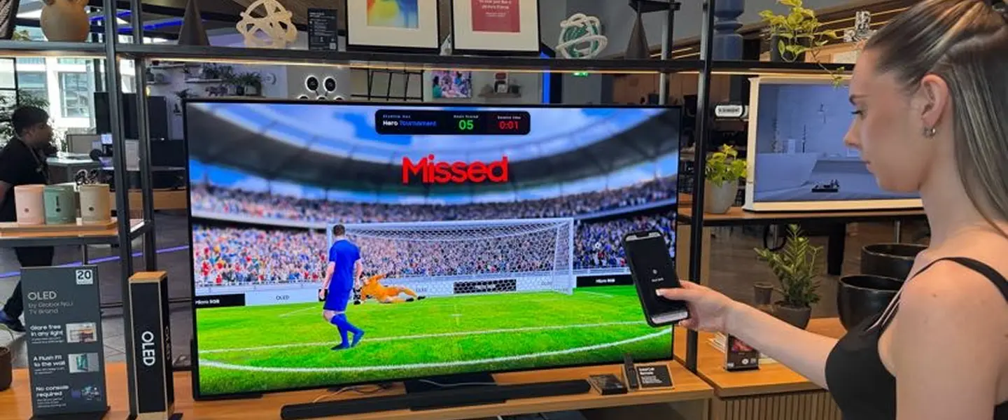 Mobile phone controlling the in-store game